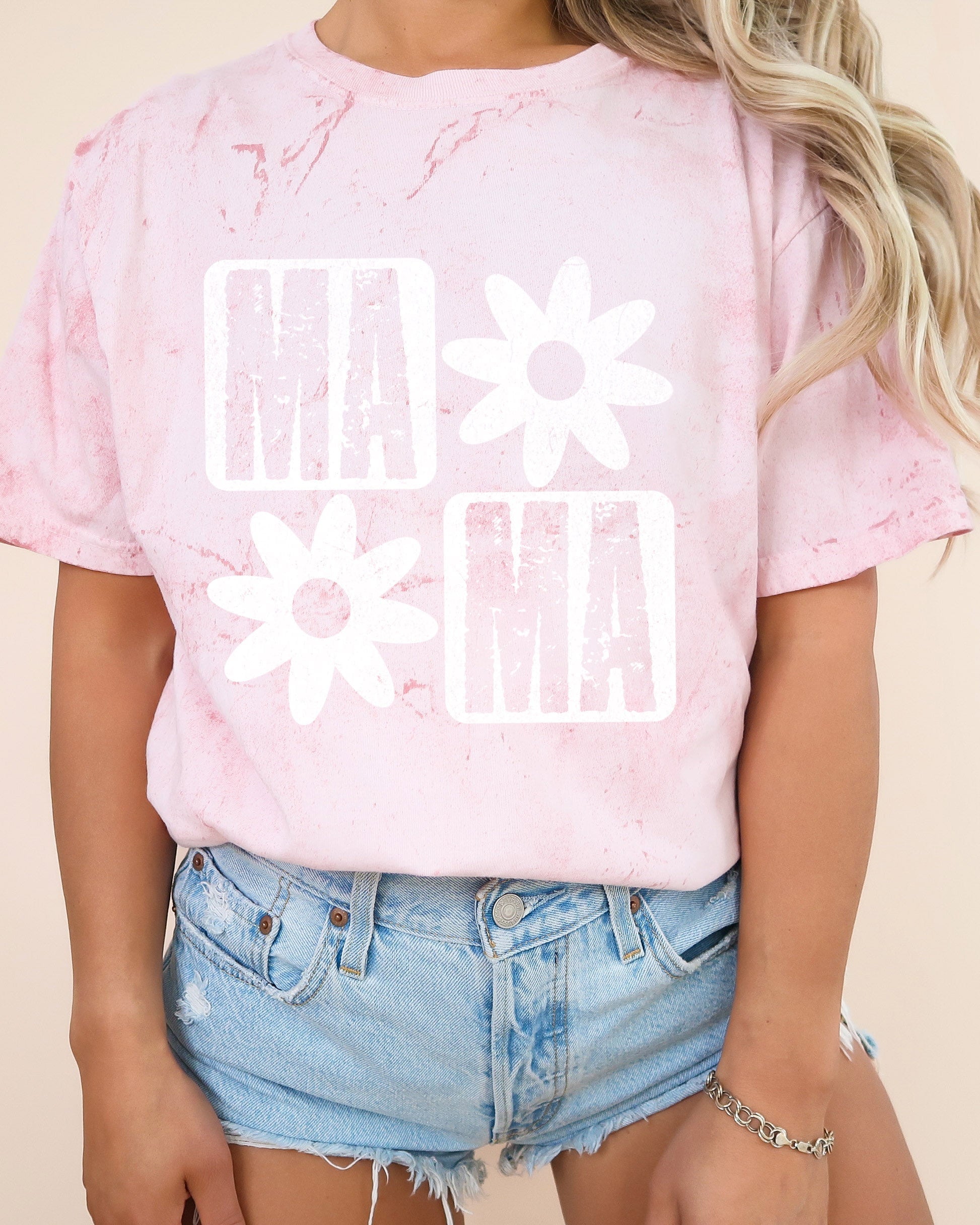 Pink short-sleeve T-shirt with white "MA" and flower graphic front