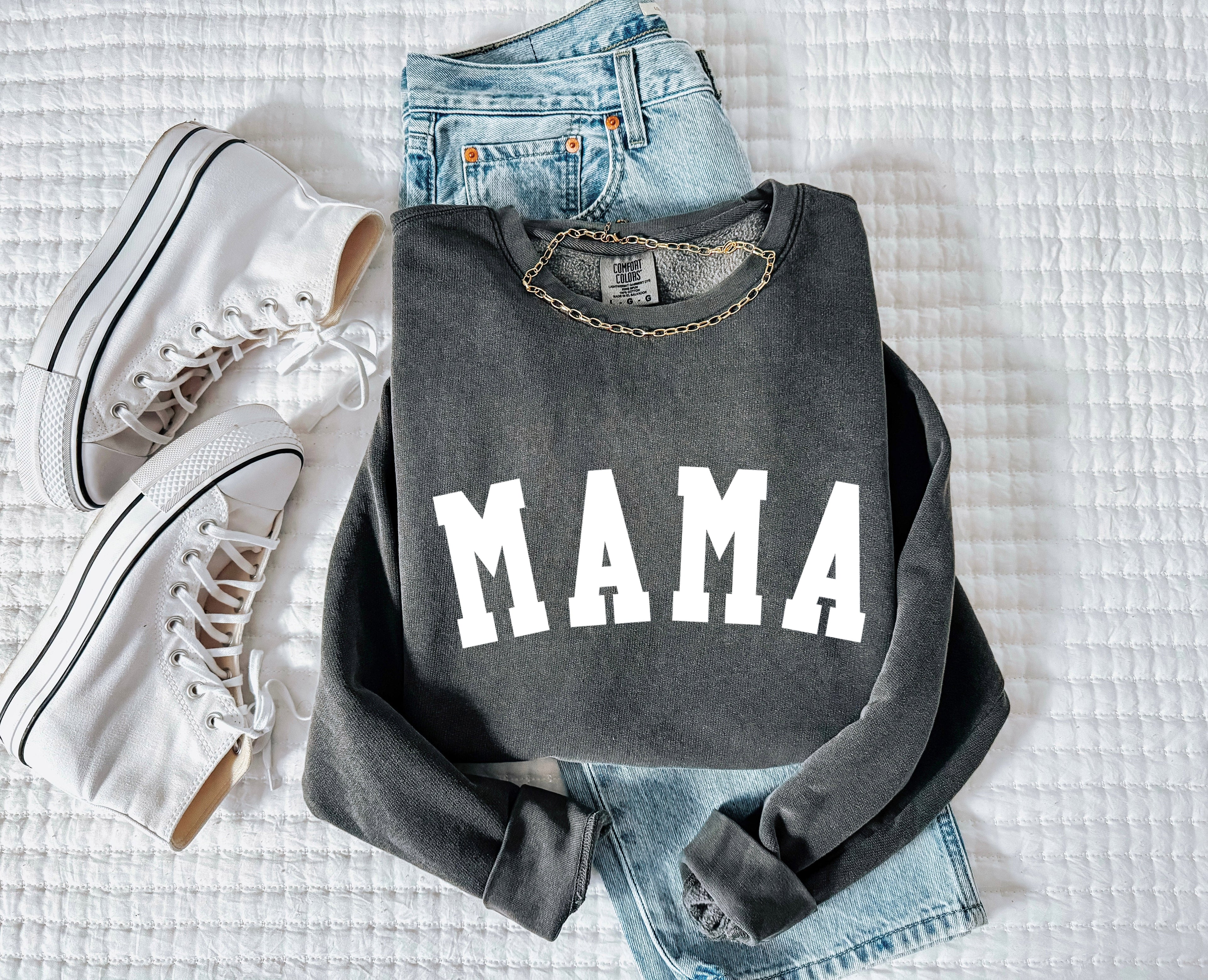 Dark gray unisex crewneck sweatshirt with large front print reading "MAMA"