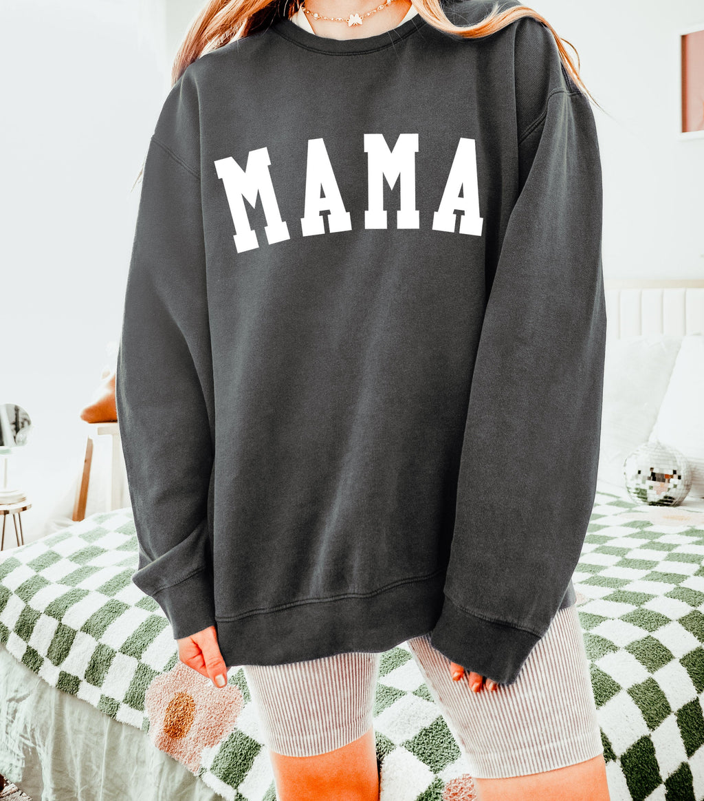 Dark gray unisex crewneck sweatshirt with large front print reading "MAMA"