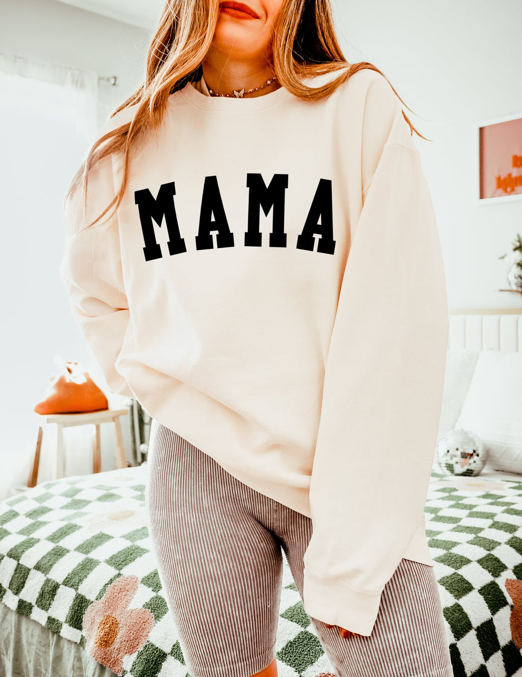 Ivory unisex crewneck sweatshirt with large front print reading "MAMA"