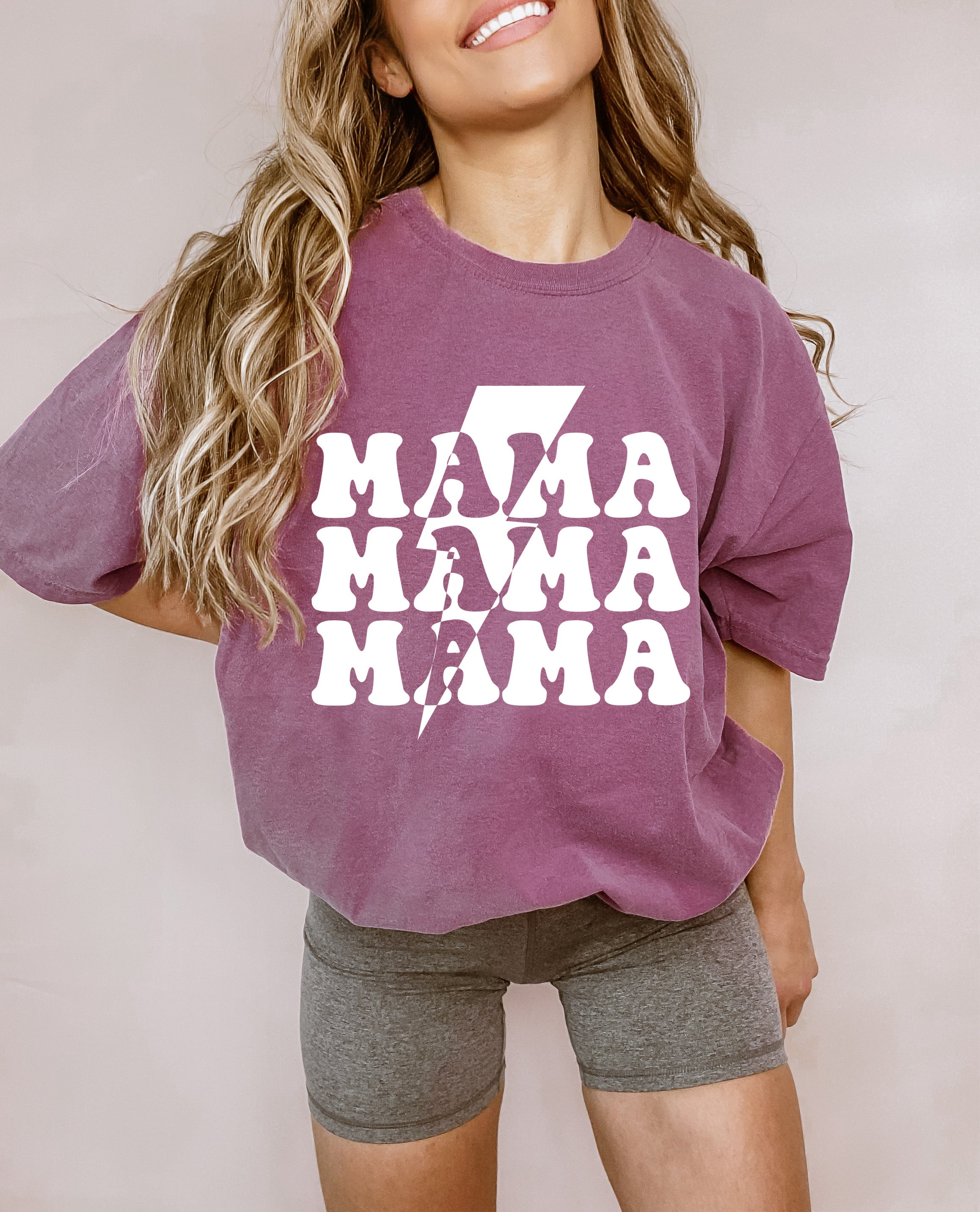 Mauve unisex T-shirt with distressed white 'MAMA' graphic on the front.