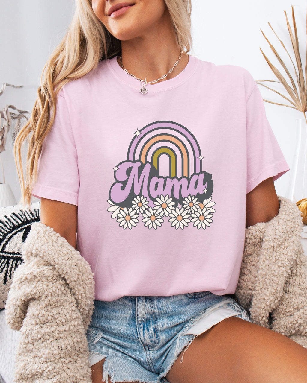 Soft pink Mama rainbow graphic comfort t-shirt with daisy flowers on front