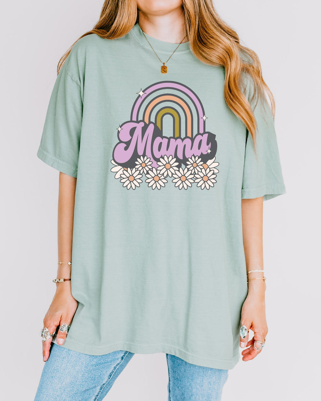 Seafoam green Mama rainbow graphic comfort t-shirt with daisy flowers on front