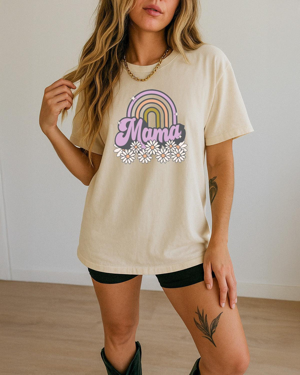 Ivory Mama rainbow graphic comfort t-shirt with daisy flowers on front