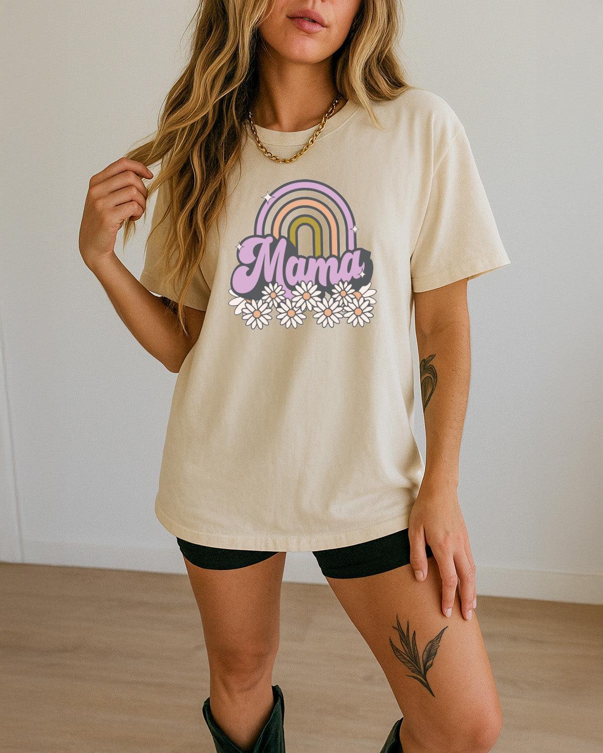 Ivory Mama rainbow graphic comfort t-shirt with daisy flowers on front