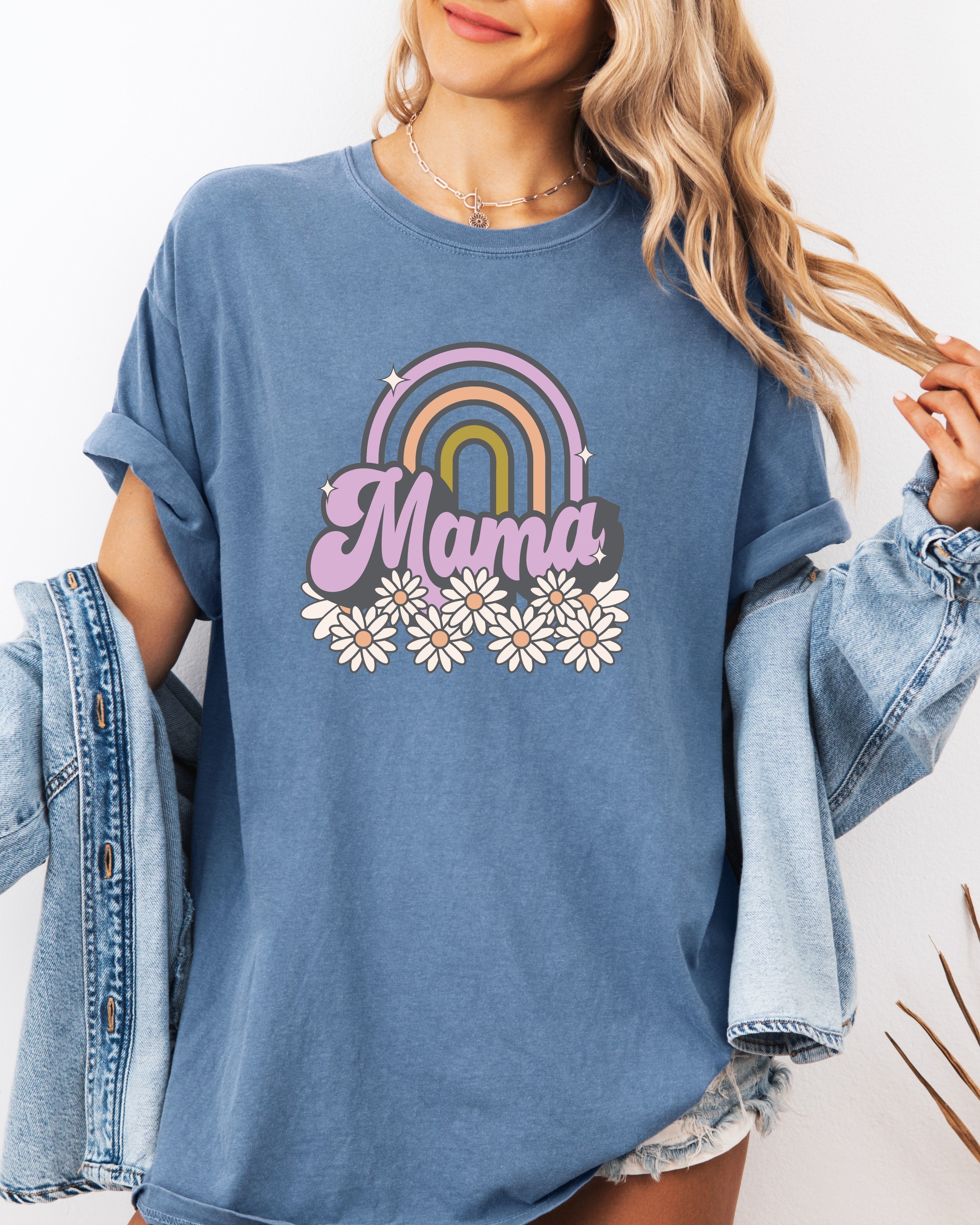 Blue comfort t-shirt with Mama rainbow graphic and daisy flowers on the front