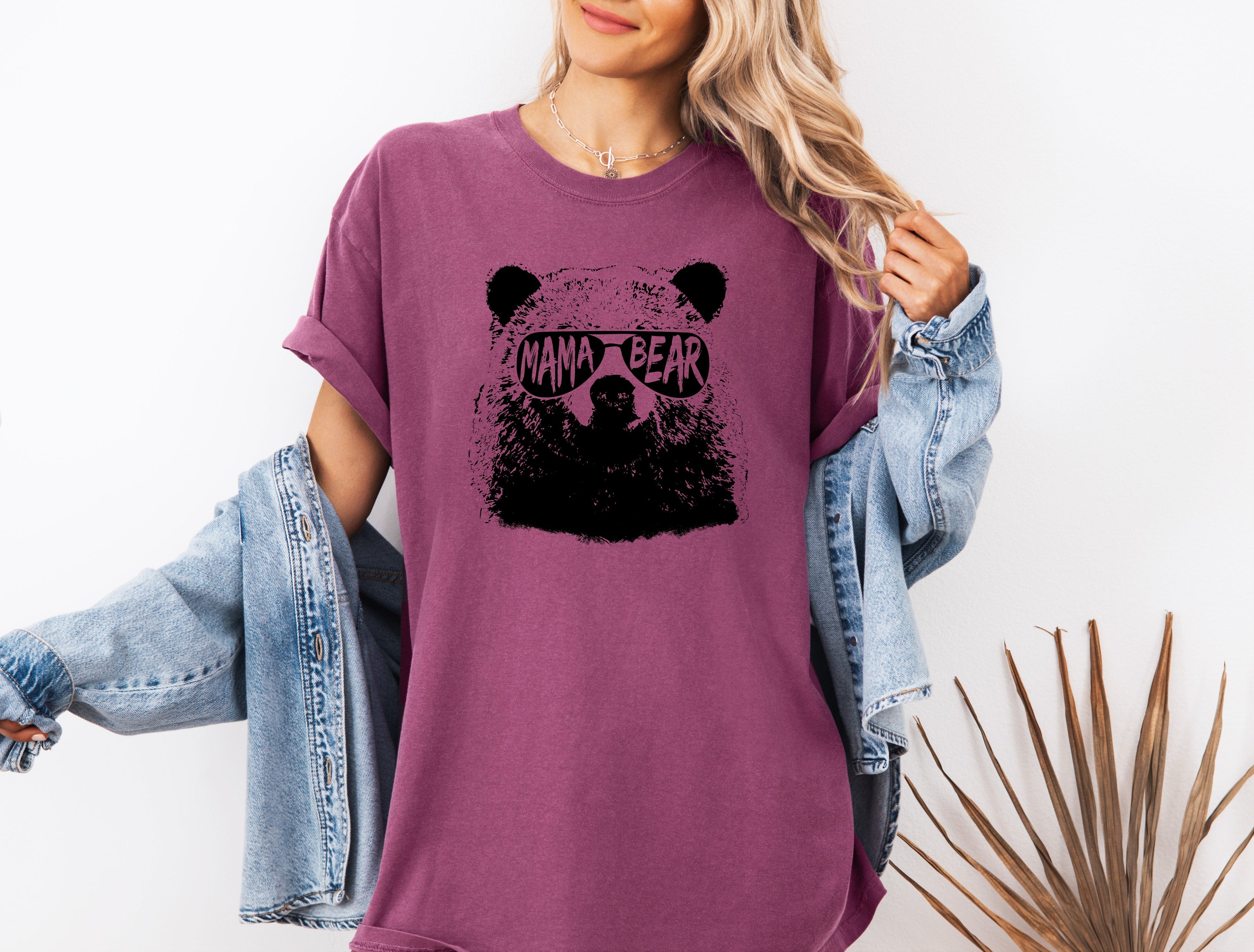 Berry garment-dyed T-shirt with black bear face graphic, short sleeves, crew neck.