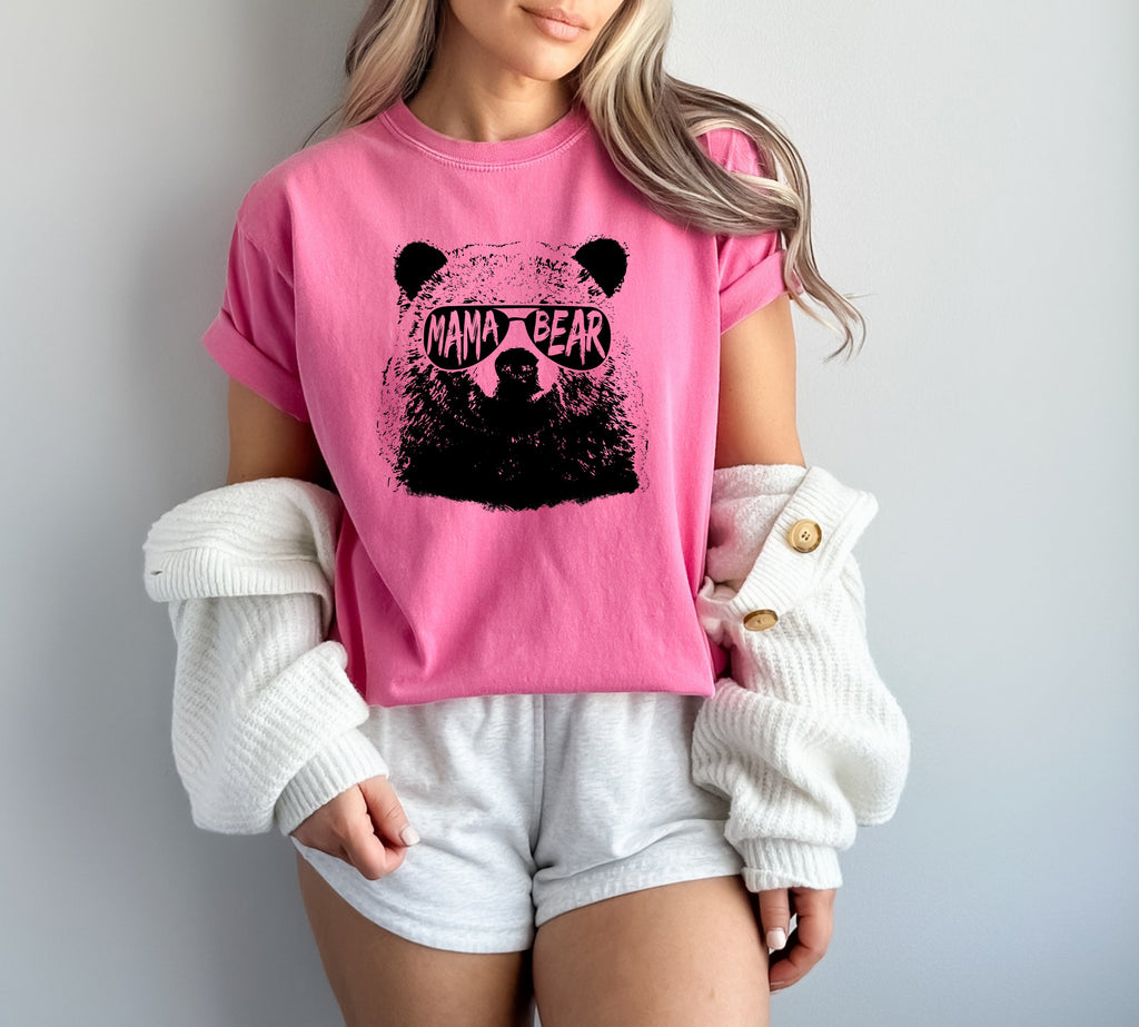 Pink garment-dyed T-shirt with black bear face graphic, short sleeves, crew neck.