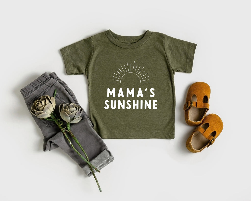 Olive green baby T-shirt with 'MAMA'S SUNSHINE' text and sunburst graphic