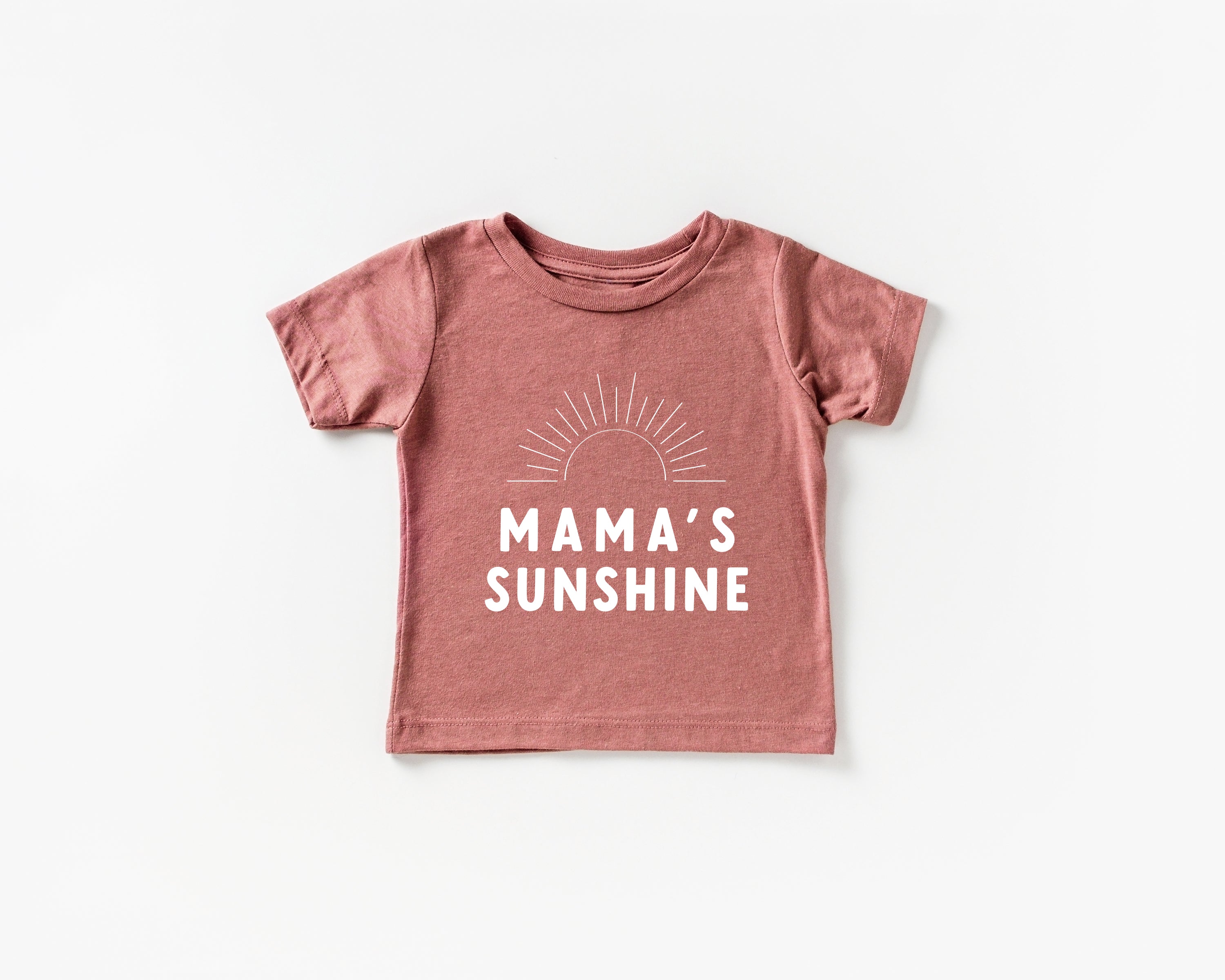 Dusty pink baby T-shirt with 'MAMA'S SUNSHINE' text and sunburst graphic