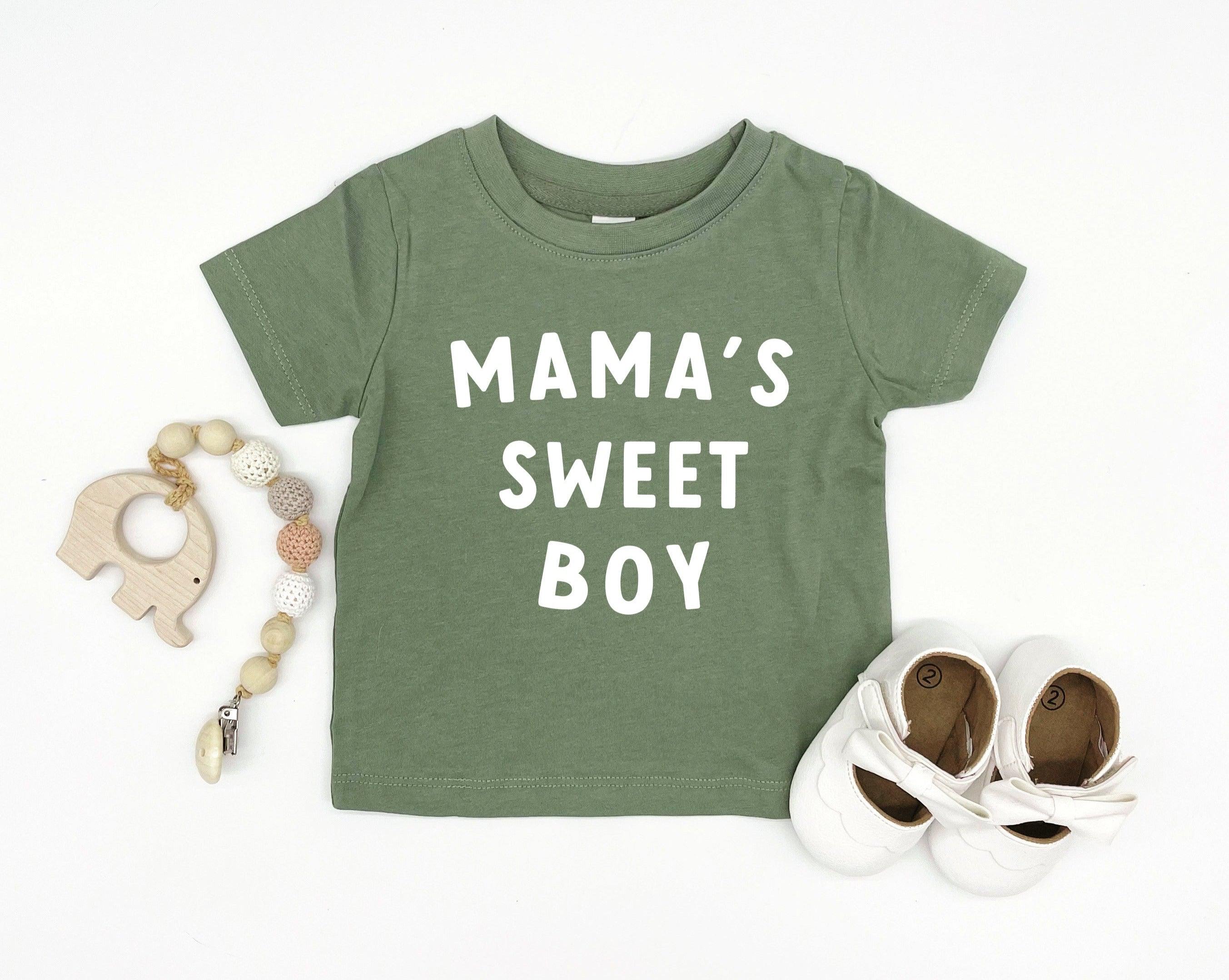 Green short-sleeve baby tee with MAMA'S SWEET BOY text