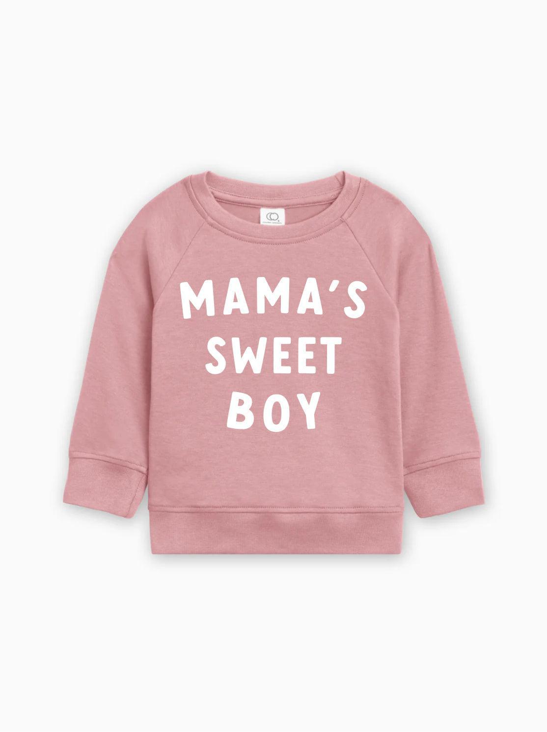 Baby pullover in dusty rose pink with white “MAMA’S SWEET BOY” text on front.