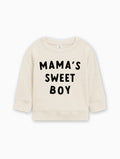 Baby pullover in natural cream with black “MAMA’S SWEET BOY” lettering on front.