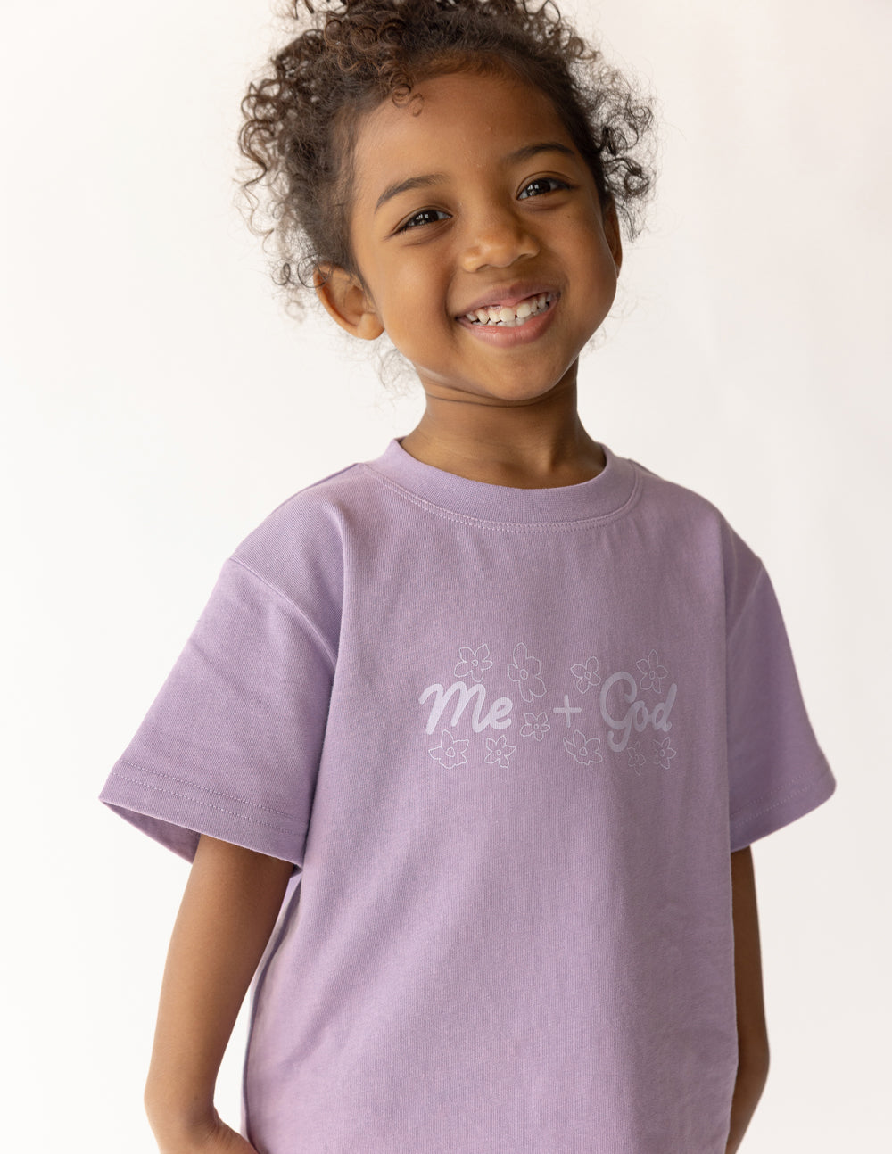 Kids lavender T-shirt with 'Me + God' graphic and floral print