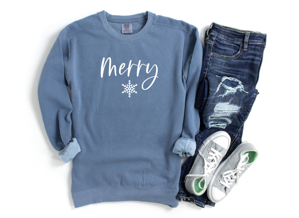 Slate blue crewneck sweatshirt with 'Merry' snowflake graphic
