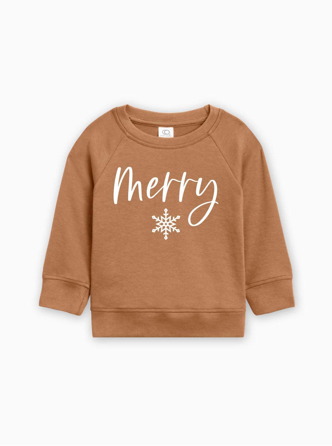 Tan organic cotton baby pullover with 'Merry' script and white snowflake graphic