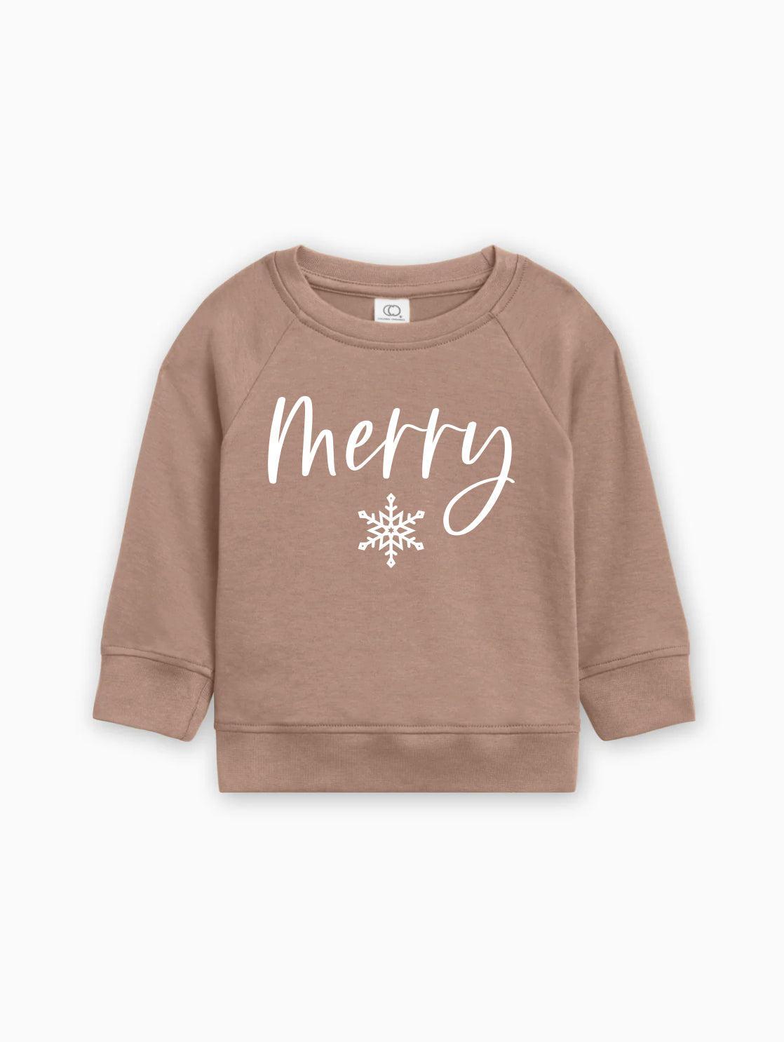 Light brown organic cotton baby pullover with 'Merry' script and white snowflake graphic