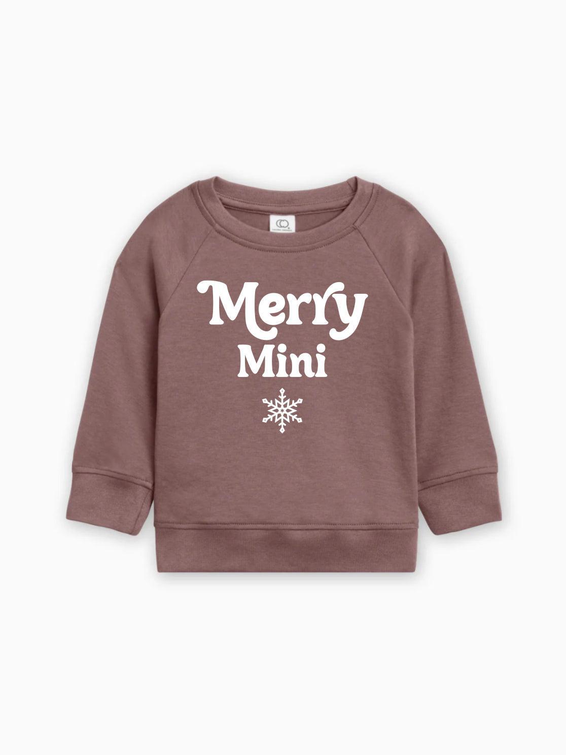 Brown baby pullover sweatshirt with “Merry Mini” text and snowflake graphic