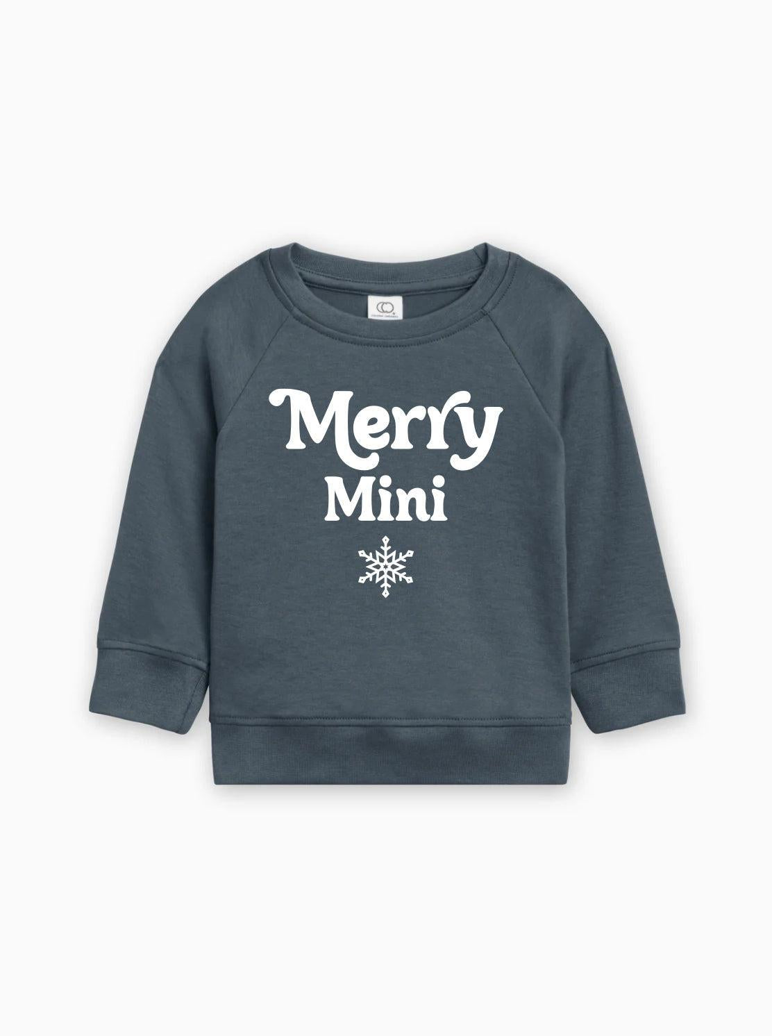 Rose pink baby pullover sweatshirt with “Merry Mini” text and snowflake graphic