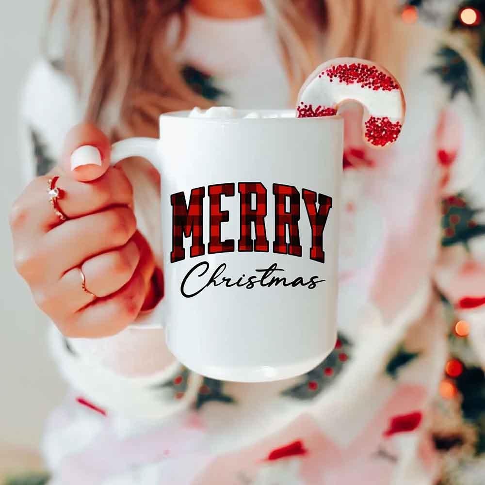 White Christmas coffee mug with red "MERRY" and cursive "Christmas" text.