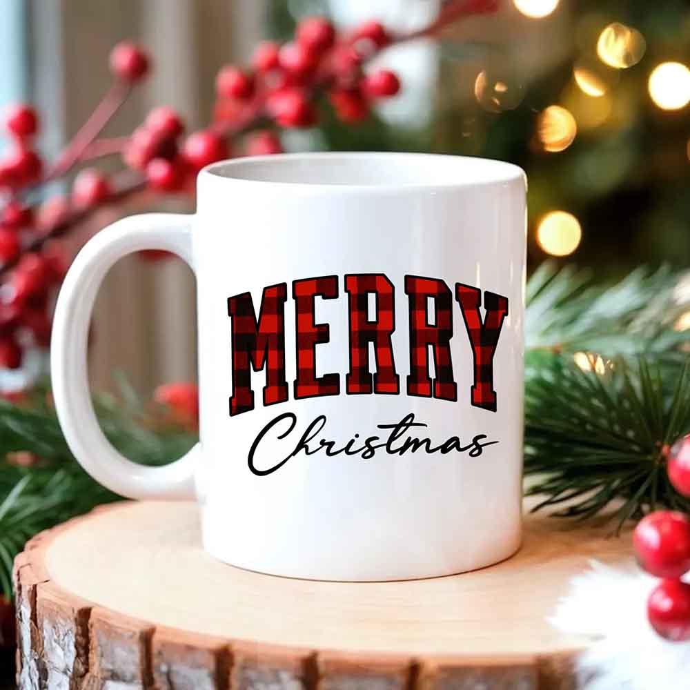 White Christmas coffee mug with red "MERRY" and cursive "Christmas" text.