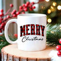 White Christmas coffee mug with red "MERRY" and cursive "Christmas" text.