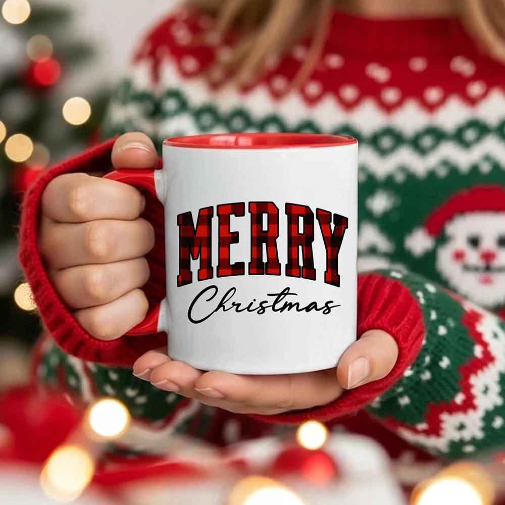 White Christmas coffee mug with red interior and red "MERRY" "Christmas" text.