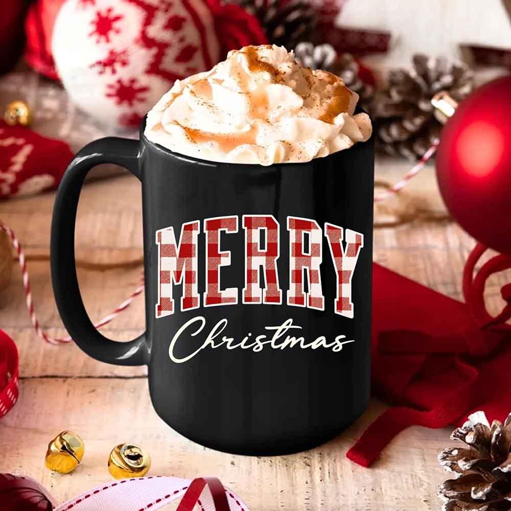 Black coffee mug with handle and front text reading "MERRY Christmas"