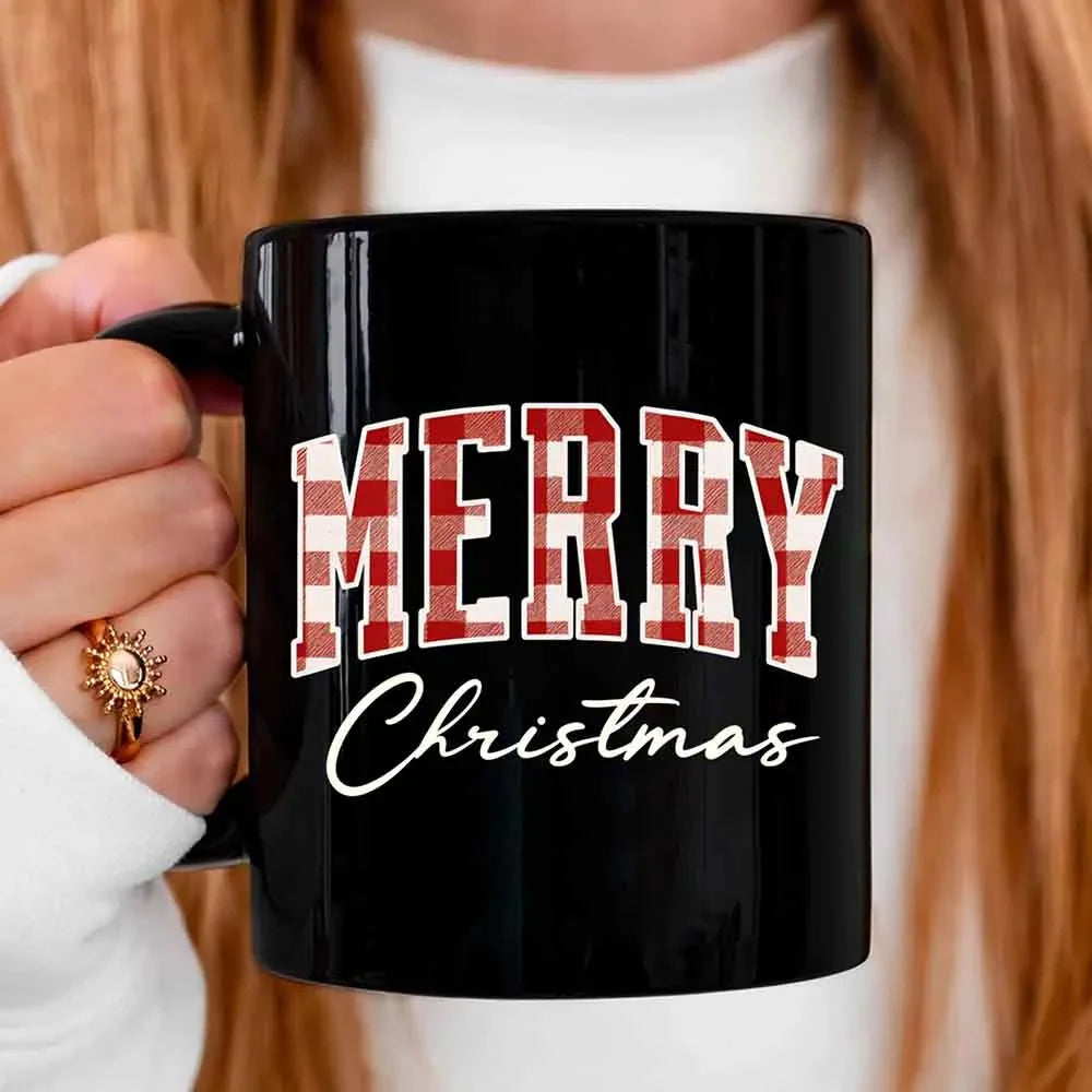 Black Christmas coffee mug with red-and-white "MERRY" and "Christmas" text.