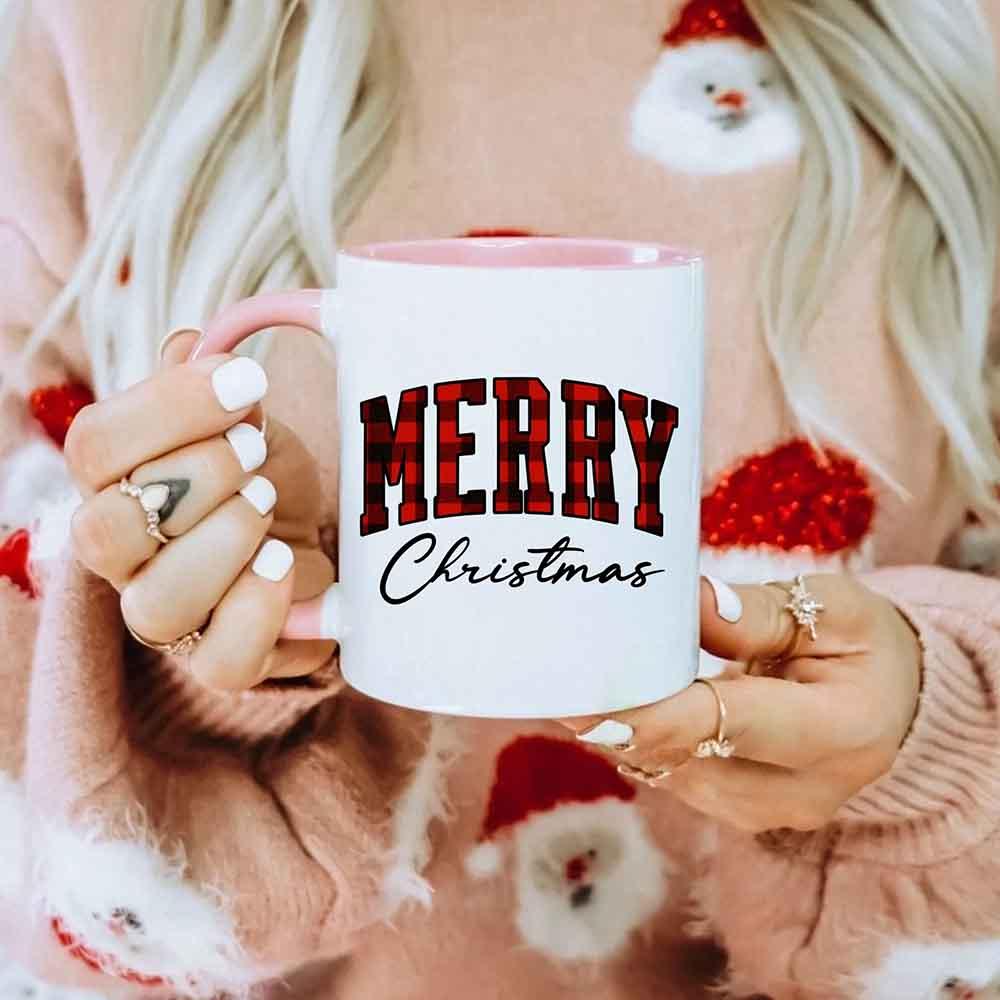 White Christmas coffee mug with red "MERRY" and "Christmas" text.
