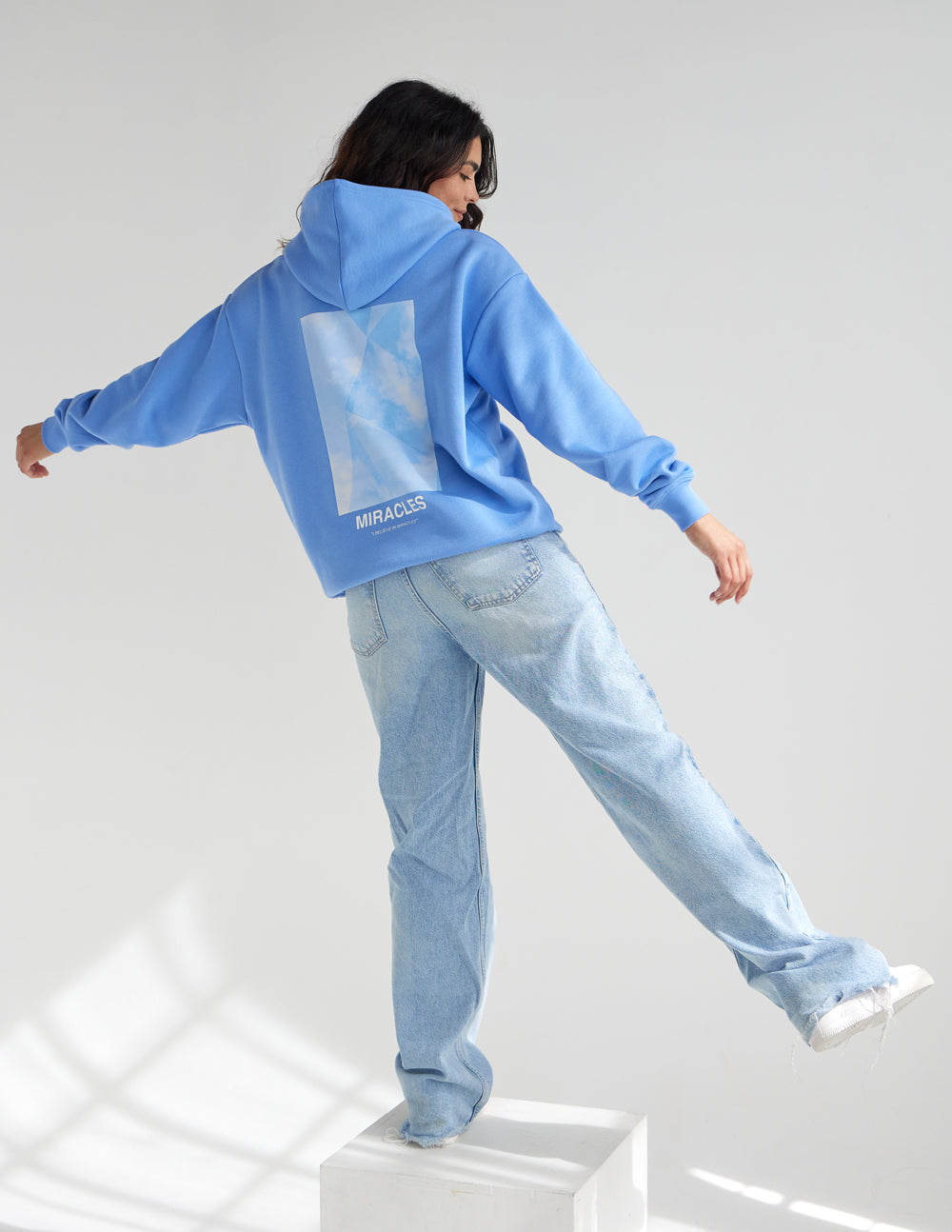 Unisex blue hoodie with hood and front pouch pocket, long sleeves