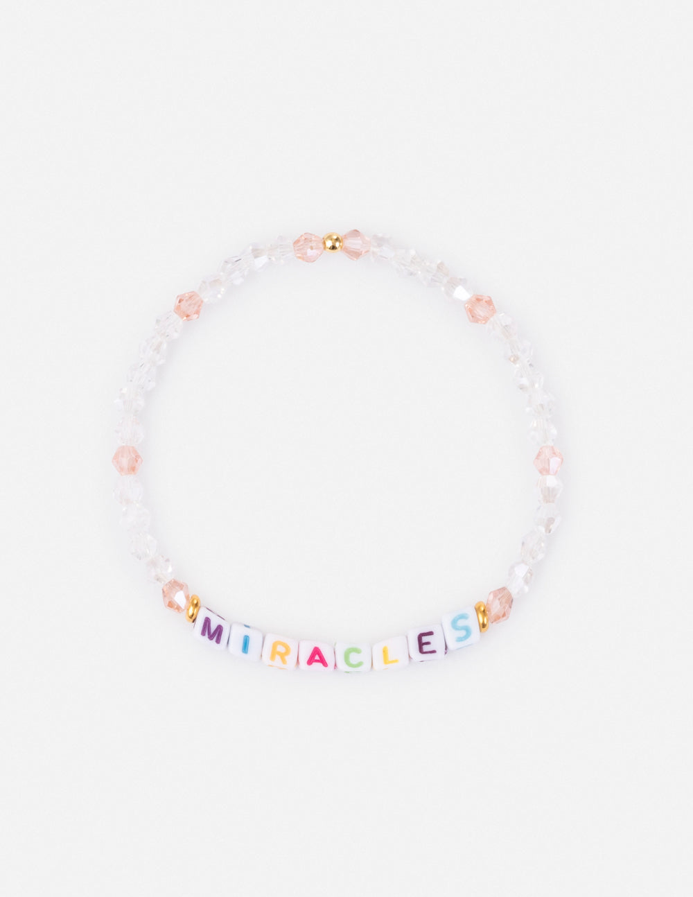 Beaded letter bracelet with pink and white beads spelling “MIRACLES”.