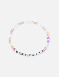 Beaded letter bracelet with multicolor beads and white text strip reading MORE FAITH