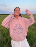 Unisex pink hoodie with hood and large front graphic, kangaroo pocket