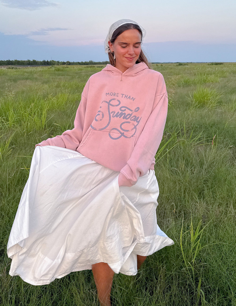 Unisex pink hoodie with hood and front logo graphic, kangaroo pocket