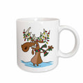White ceramic mug with cartoon moose holding Christmas lights and greenery