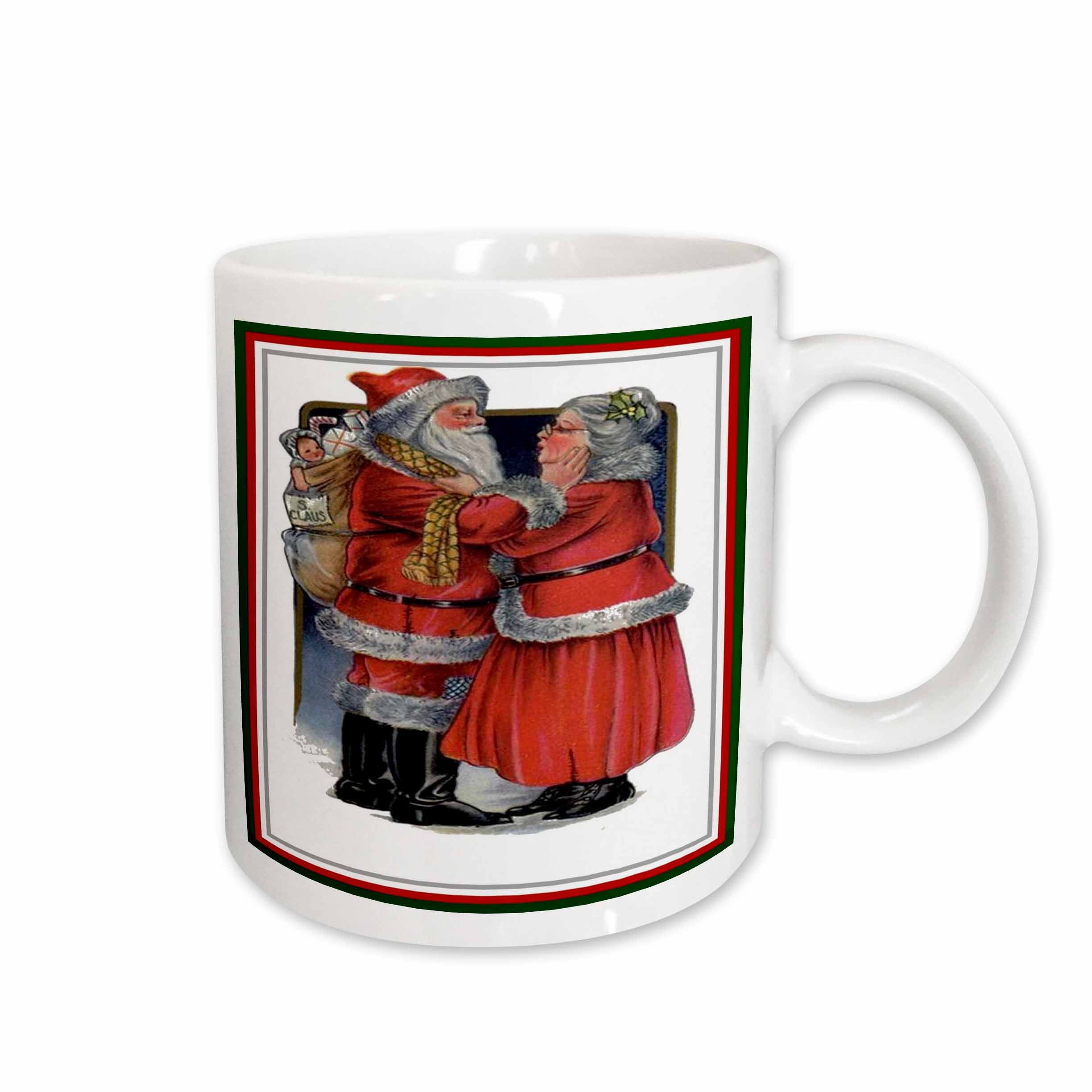 White mug with Santa and Mrs Claus graphic, white handle and rim