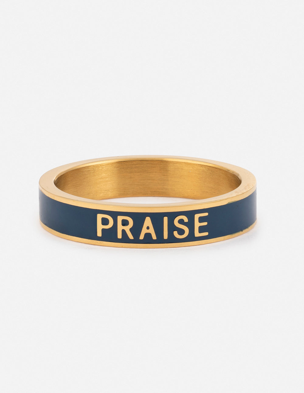 Navy enamel statement ring with gold band and “PRAISE” lettering across top