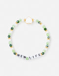 Green beaded letter bracelet with 'NEW LIFE' lettering and gold clasp