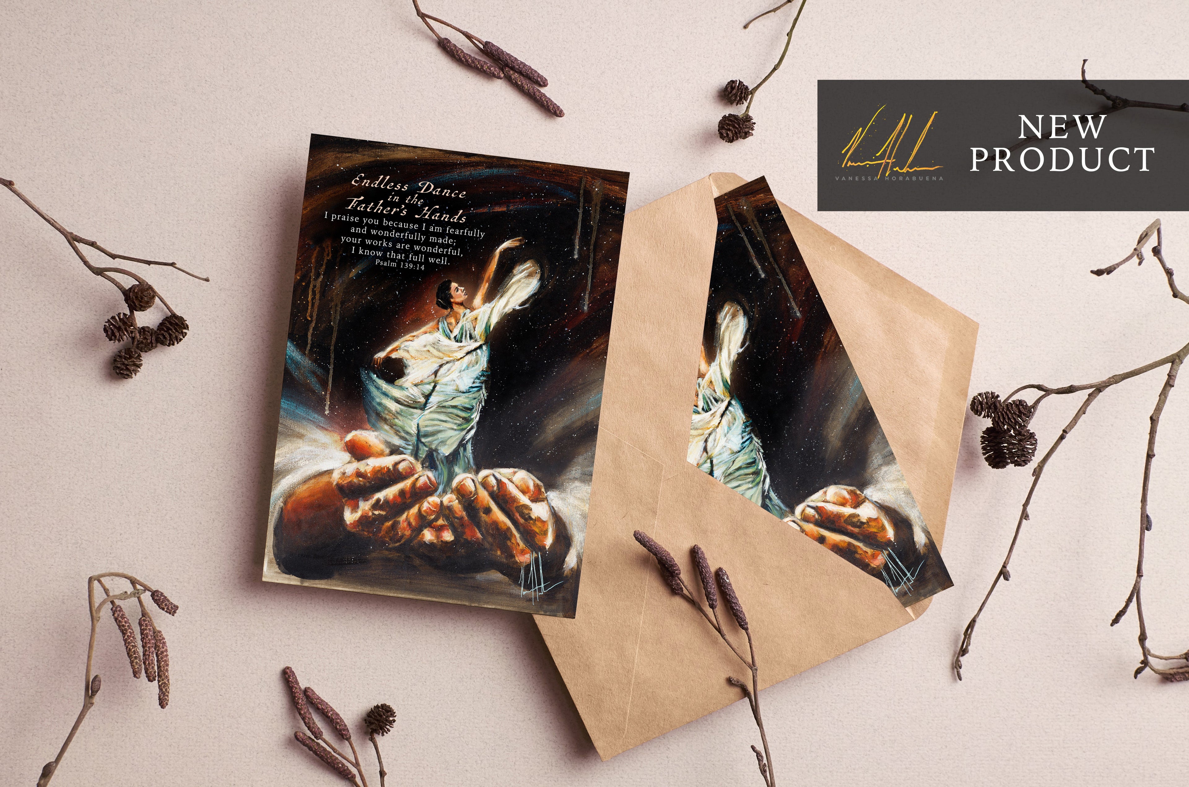 Greeting cards with dark angel artwork, in brown kraft sleeves, on twig decoration.