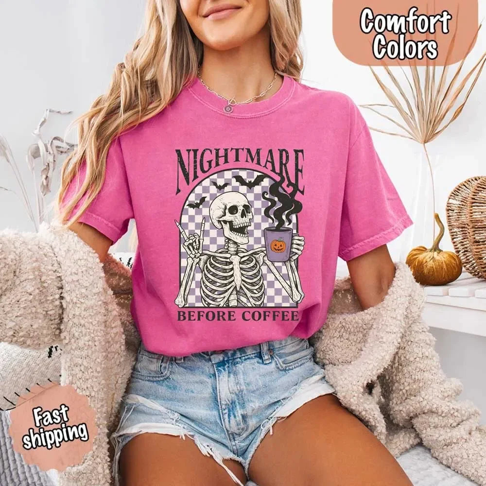 Purple crewneck T-shirt with skeleton coffee graphic, jack-o-lantern cup