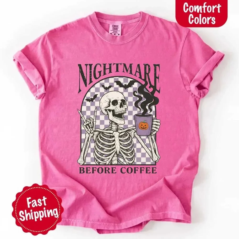 Pink crewneck T-shirt with skeleton holding coffee cup graphic