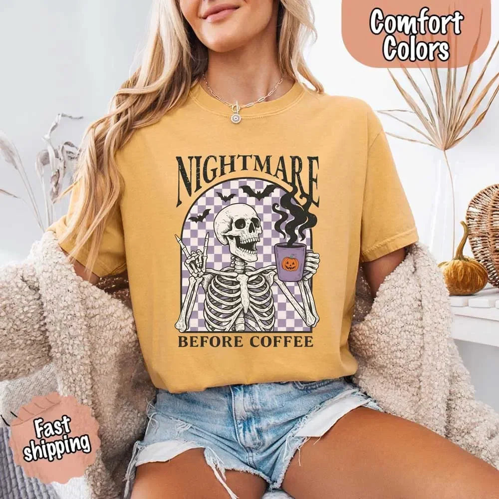 Tan crewneck T-shirt with skeleton coffee graphic and checkered background