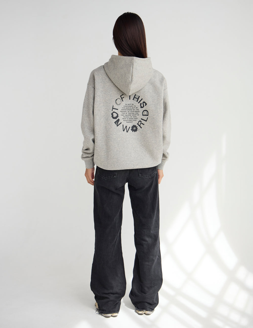 Light beige unisex hoodie with hood and large back logo graphic, long sleeves