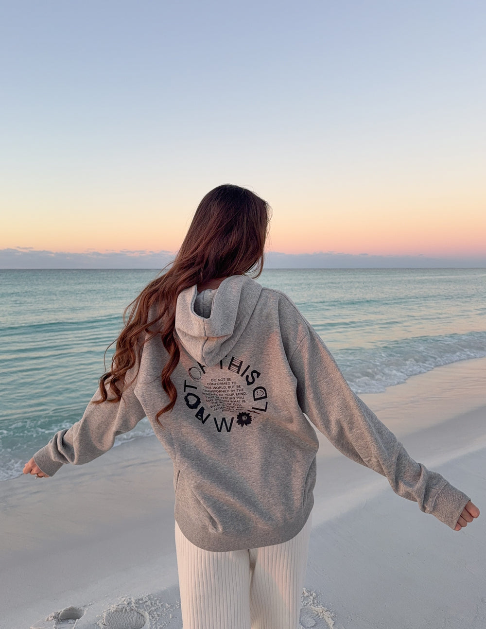 Light beige unisex hoodie, hooded back with large circular logo graphic