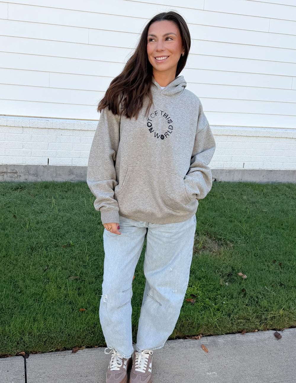 Light beige unisex hoodie with hood and front circular logo, front pouch pocket