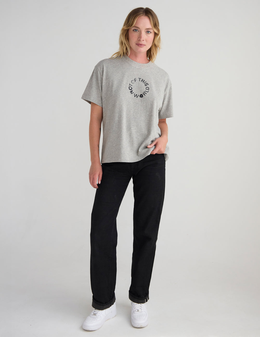 Unisex heather gray graphic T-shirt with crew neck and front circular text logo