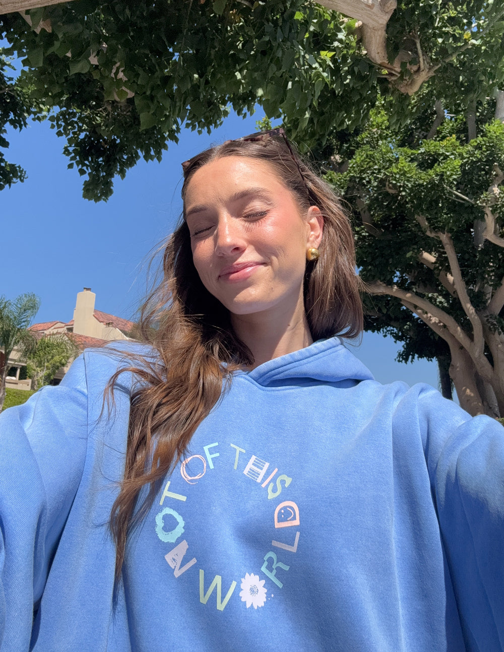 Blue unisex hoodie with hood and bold front chest graphic