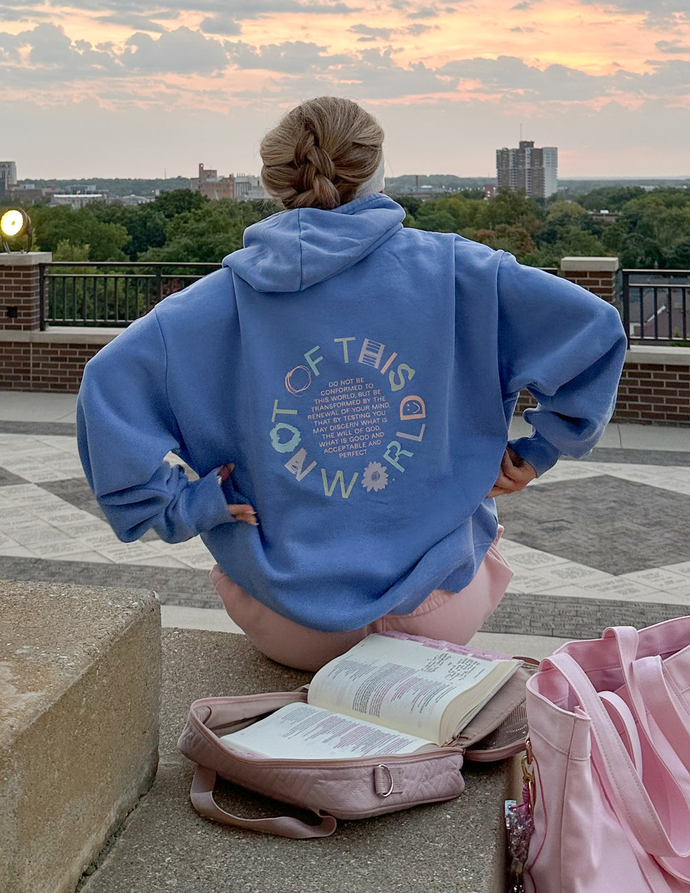 Blue unisex pullover hoodie with large back graphic print and hood