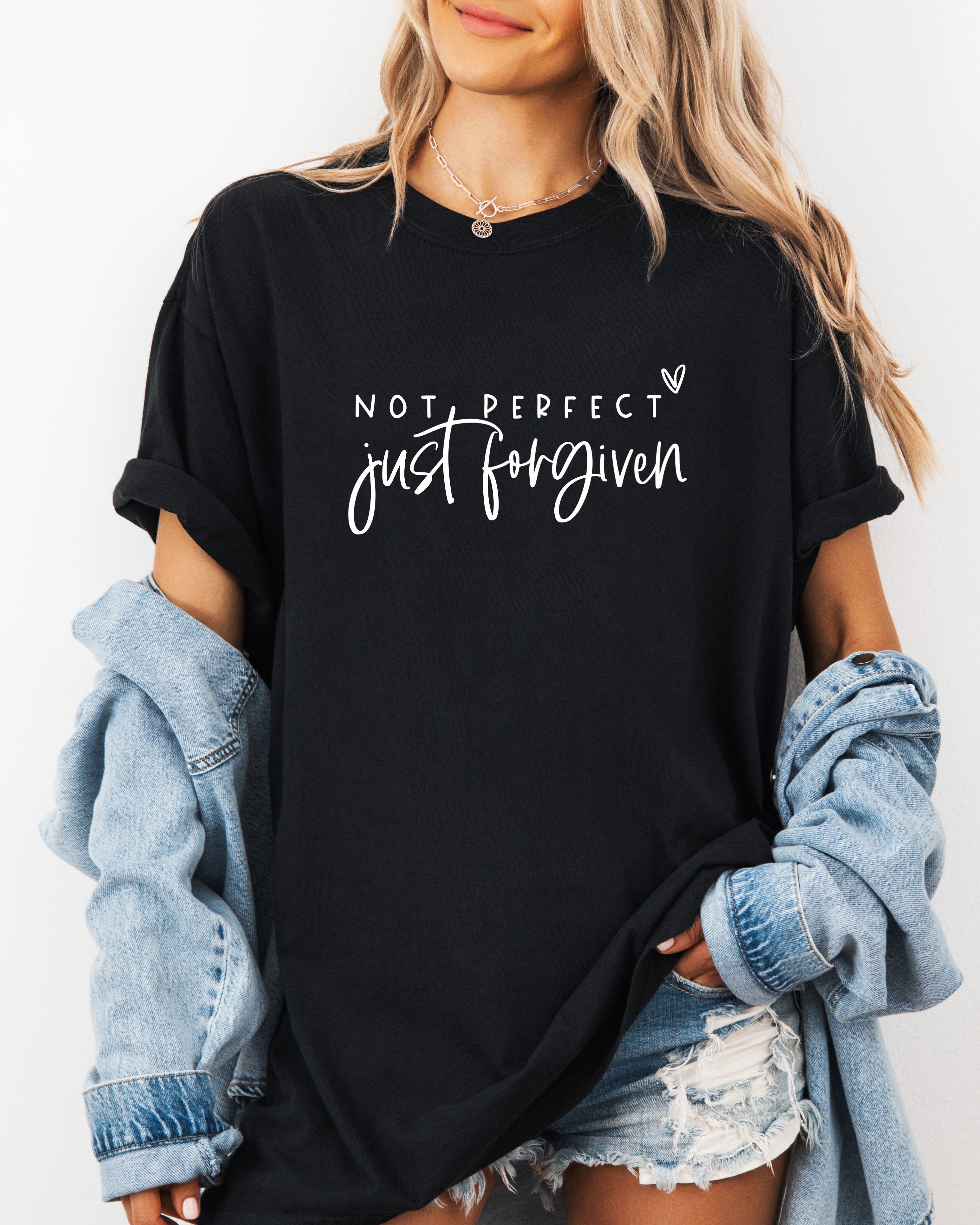 Black garment-dyed T-shirt with “Not perfect, just forgiven” graphic